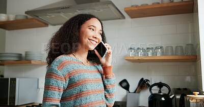 Woman, kitchen and phone call or laughing at home, happy and relaxing in apartment. Female person, communication and mobile application for funny online conversation, humor and internet connection