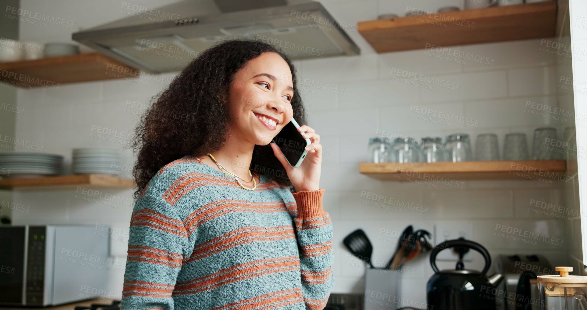 Buy stock photo Woman, kitchen and phone call or laughing at home, happy and relaxing in apartment. Female person, communication and mobile application for funny online conversation, humor and internet connection