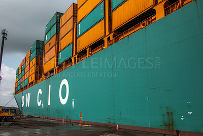 Cargo ship, harbour and container for trade, transport, and economics. Freight, long journey and export for global delivery. Goods, services and stock for distribution to international market.