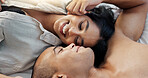 Happy couple, relax and bed for morning, romance or love in embrace, trust or care above at home. Young man and woman smile lying in bedroom rest for intimacy, passion or bonding together at house