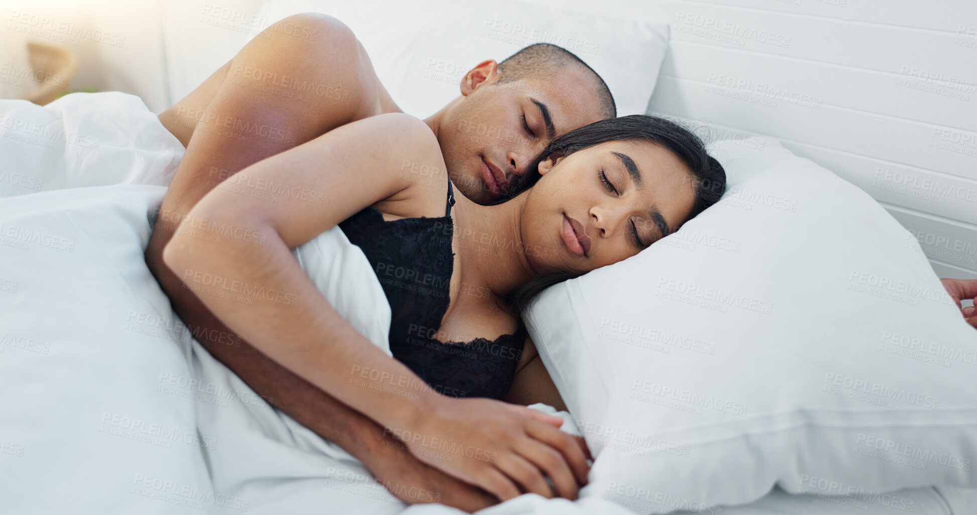 Buy stock photo Couple, hugging and sleeping in bed, love and resting or comfortable at home on weekend. People, bedroom and security in embrace, bonding and relaxation on sunday morning and peace or dreaming