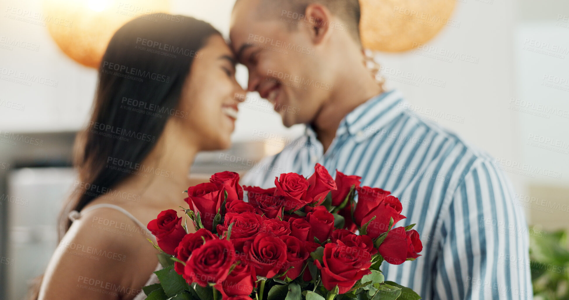 Buy stock photo Couple, flowers and kiss for anniversary celebration, marriage and loyalty or commitment to love. People, happy and romance for relationship milestone, bonding and plant gift for support at home