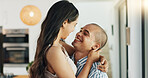 Couple, hug and kissing for love at home, happy and support in marriage and embrace for romance. People, spin and bonding together for relationship, lovers and commitment or loyalty in apartment