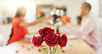 Couple, roses and toast at home with wine glass for celebration of love, romance and valentines day. People cheers for date success, drinking red champagne and luxury dinner at a table with flowers