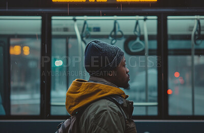 City, bus stop and young man waiting for shuttle for public transport, commute and transportation in the city. African male, employee and student at a station for commuting, explore and urban travel