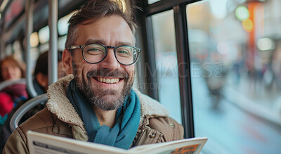 Man, reading newspaper and morning bus ride to the office for public transport, passengers and commute. Single male, employee and happy in city transportation for travel or urban explore