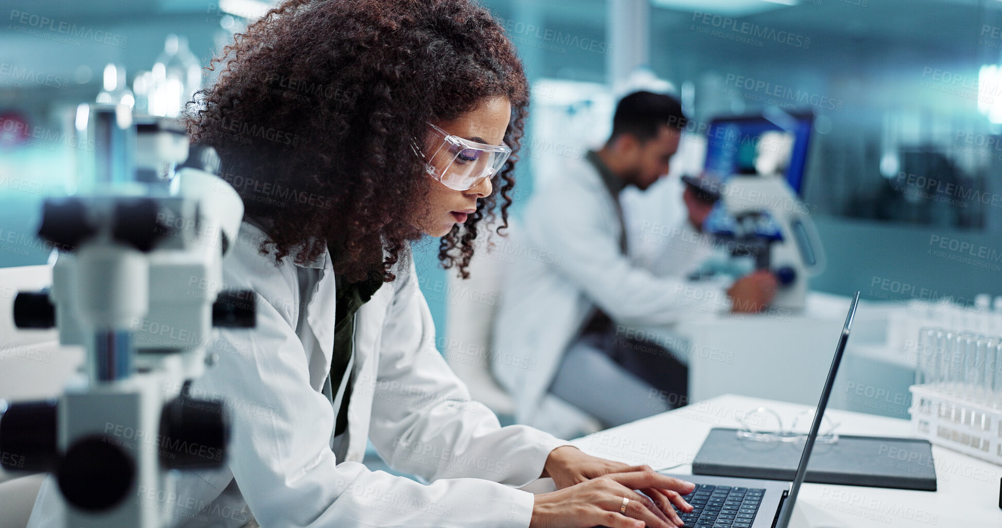 Buy stock photo Scientist, woman and microscope with computer for laboratory research, test and DNA investigation at night. Professional doctor or science expert with lens check, laptop and particles for inspection