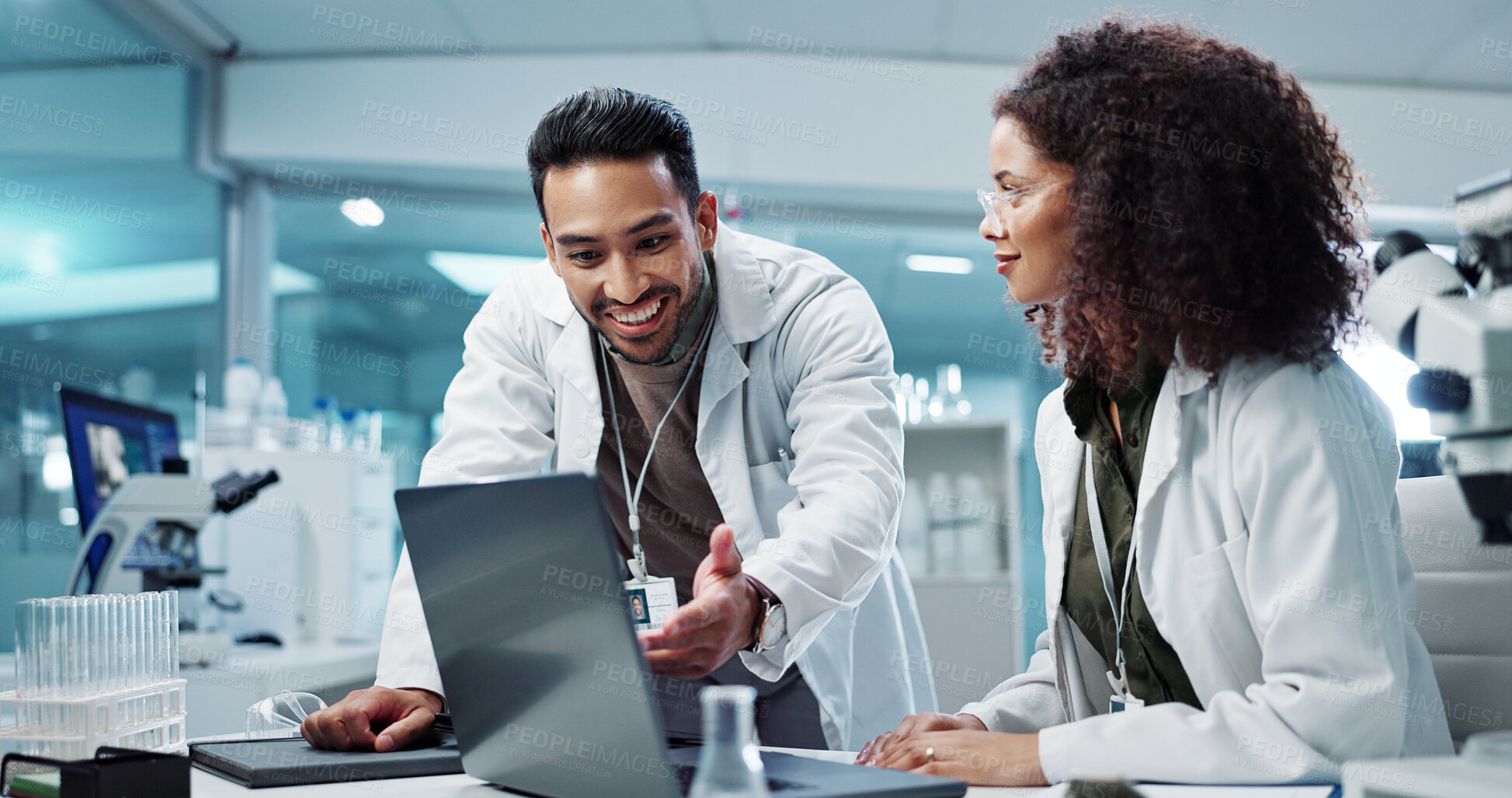 Buy stock photo Scientist, teamwork and happy with laptop in laboratory for test breakthrough, pharmaceutical review or success. Science, collaboration or technology for research, discussion and digital analysis