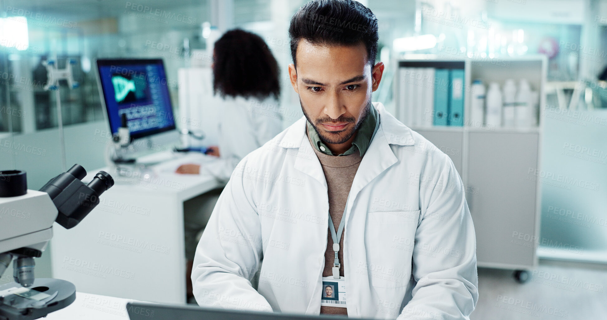 Buy stock photo Scientist, man and reading computer for laboratory test, typing report or medical results of DNA at night. Asian expert thinking on computer for science research, biotechnology and molecule analysis