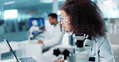 Laptop, woman or scientist with microscope or research in lab for chemistry report or medical test feedback. Bacteria, person typing or science update for online medicine development news on website