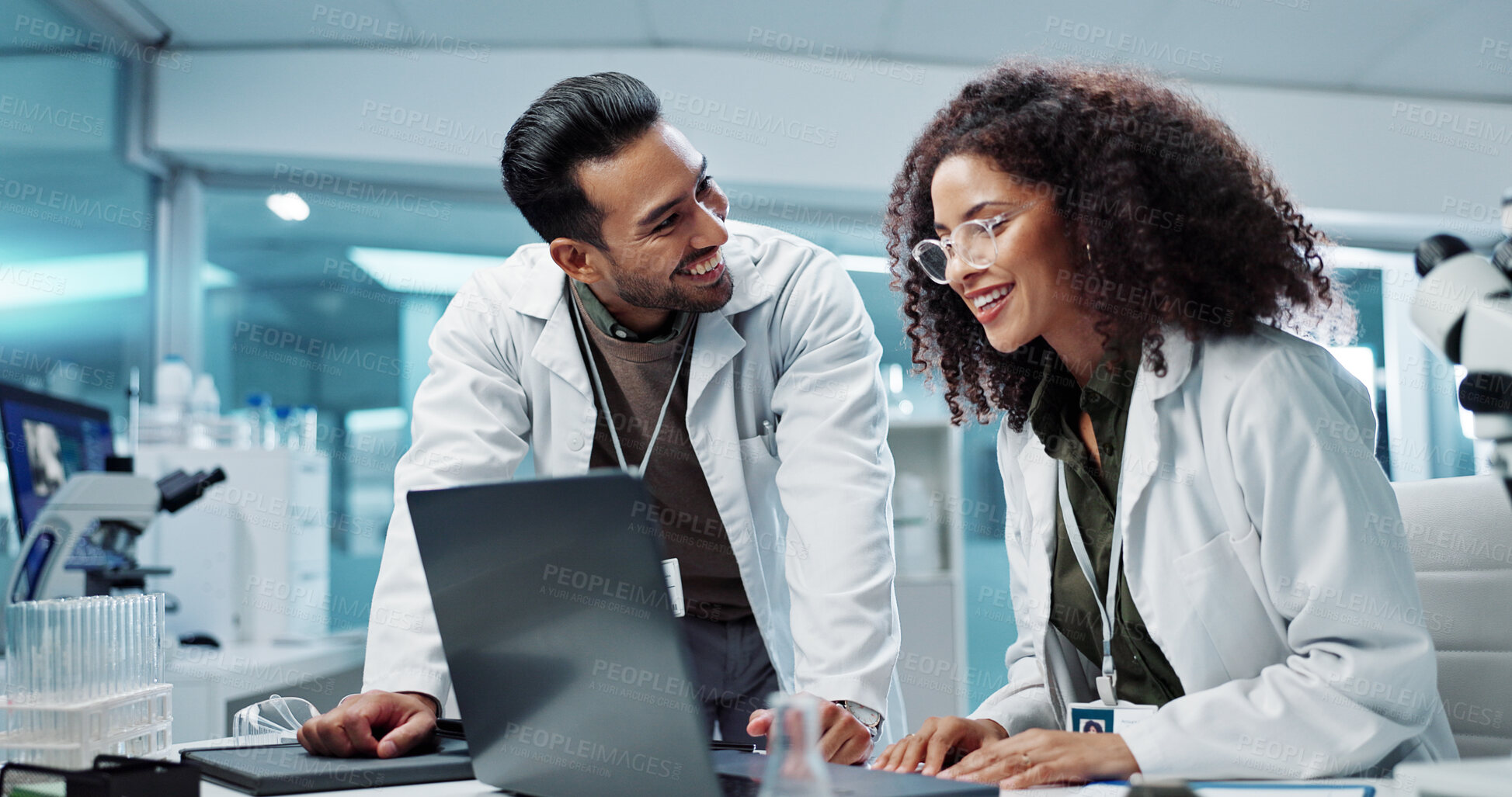 Buy stock photo Scientist, teamwork and happy with laptop in laboratory for test breakthrough, pharmaceutical review or success. Science, collaboration or technology for research, discussion and digital analysis