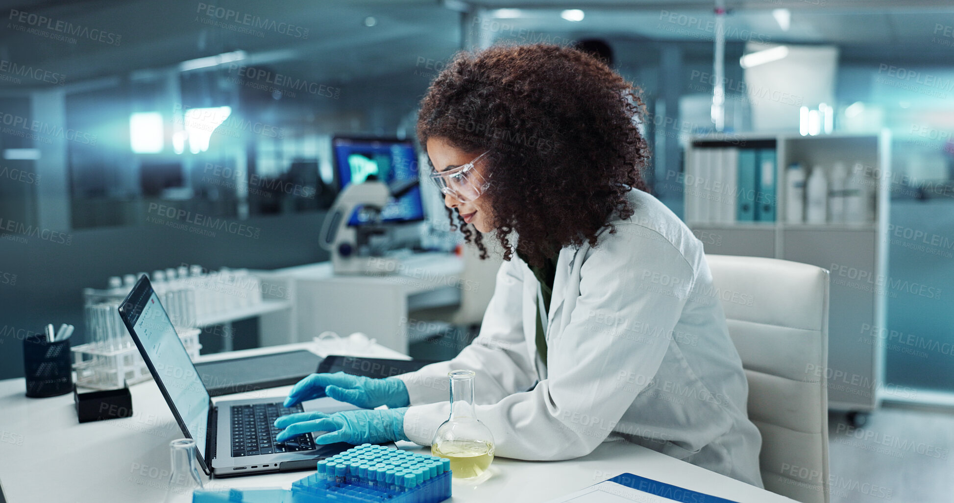 Buy stock photo Scientist, woman and typing on laptop with test tube for chemistry, research or experiment at lab. Science, computer and serious medical professional in development of cure, biotechnology or study