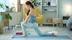 Woman, yoga and stretching for fitness, wellness in healthy spiritual zen exercise for mental wellbeing at home. Female in calm, relax and peaceful exercising workout for mind, body and spirit on mat