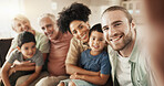 Selfie, happy and face of a big family in the living room relaxing, bonding and spending time together. Smile, love and portrait of boy children sitting with parents and grandparents at their home.