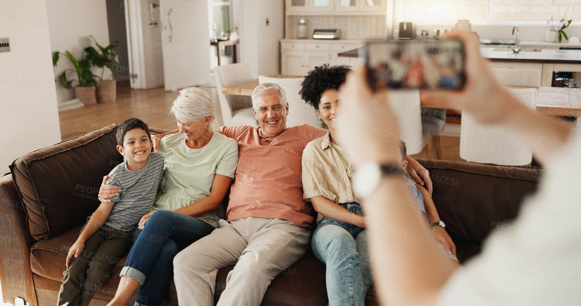 Buy stock photo Phone picture, hands and home happy family, bond and memory photo of weekend reunion, love and time together. Social media app, cellphone or relax grandparents, parents and kids smile for online post