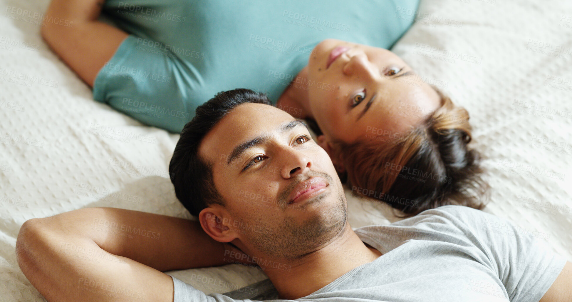 Buy stock photo Happy people in bedroom, couple talking of love and marriage bonding happiness in Mexico home. Indian man joke with girlfriend on bed, relax in hotel together and young asian woman laughing smile