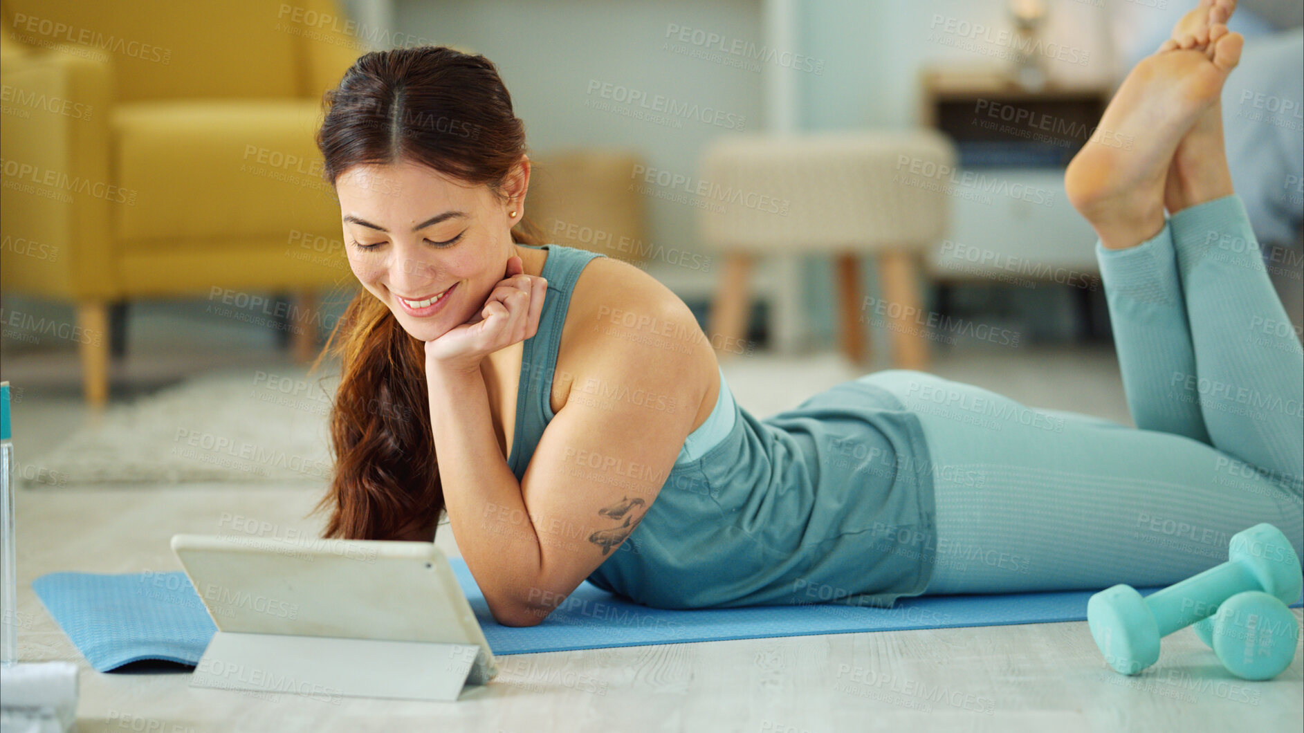 Buy stock photo Fitness, internet and woman streaming on a tablet for training, yoga and exercise on the floor of her house. Happy, young and wellness girl with technology for a workout, cardio or video on pilates