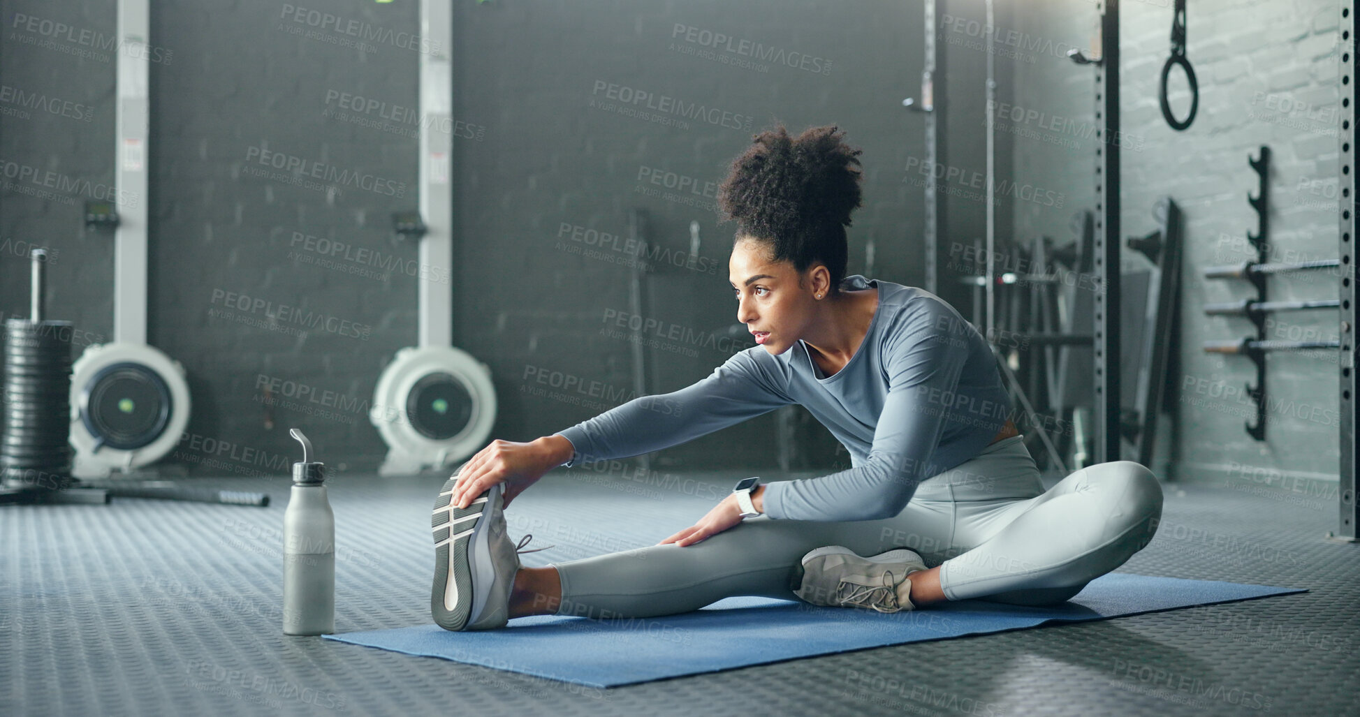 Buy stock photo Black woman, gym and stretching, fitness and exercise motivation and body training for sport and health. Healthy, wellness and preparing for workout, warm up and stretch for active lifestyle.