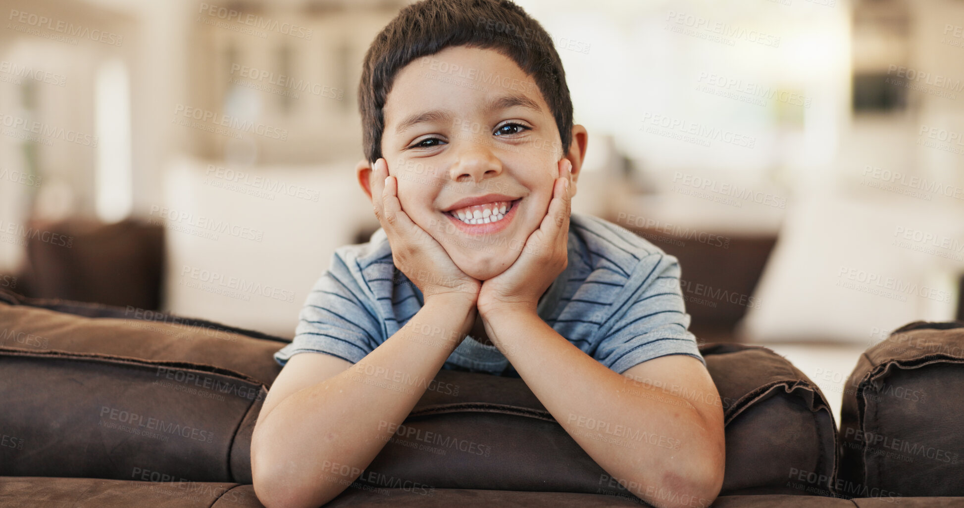 Buy stock photo Happy, cute and face of a child on the sofa for playing, relax and weekend fun. Smile, youth and portrait of a little boy kid with an adorable expression, charming and on vacation on the couch