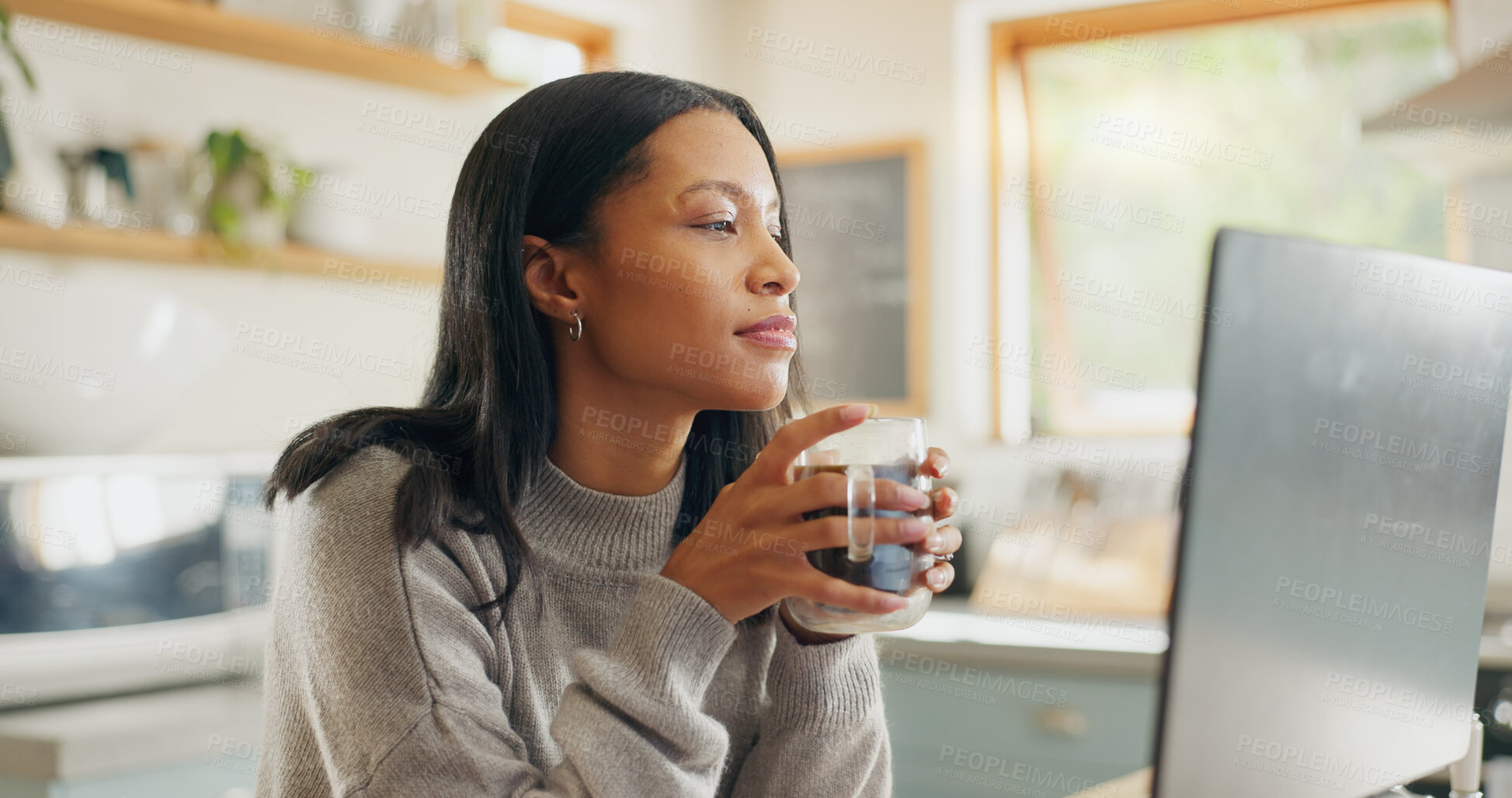 Buy stock photo Laptop, coffee and freelance with a woman entrepreneur in the kitchen of her home for small business. Computer, report or email with a young female employee remote working on a startup from her house