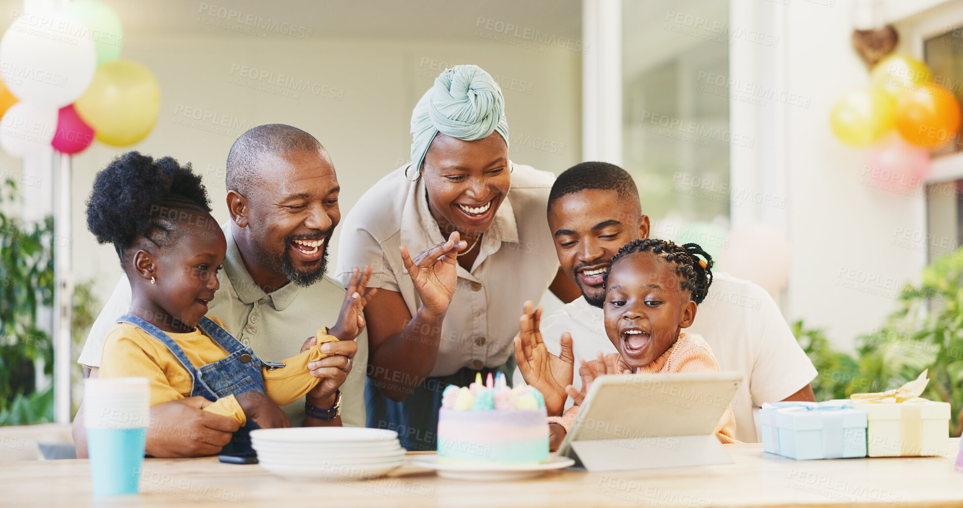 Buy stock photo Black family, birthday cake and candles for children to celebrate with parents at a table. African woman, men and happy kids at home for a party, quality time and bonding or fun with love and care