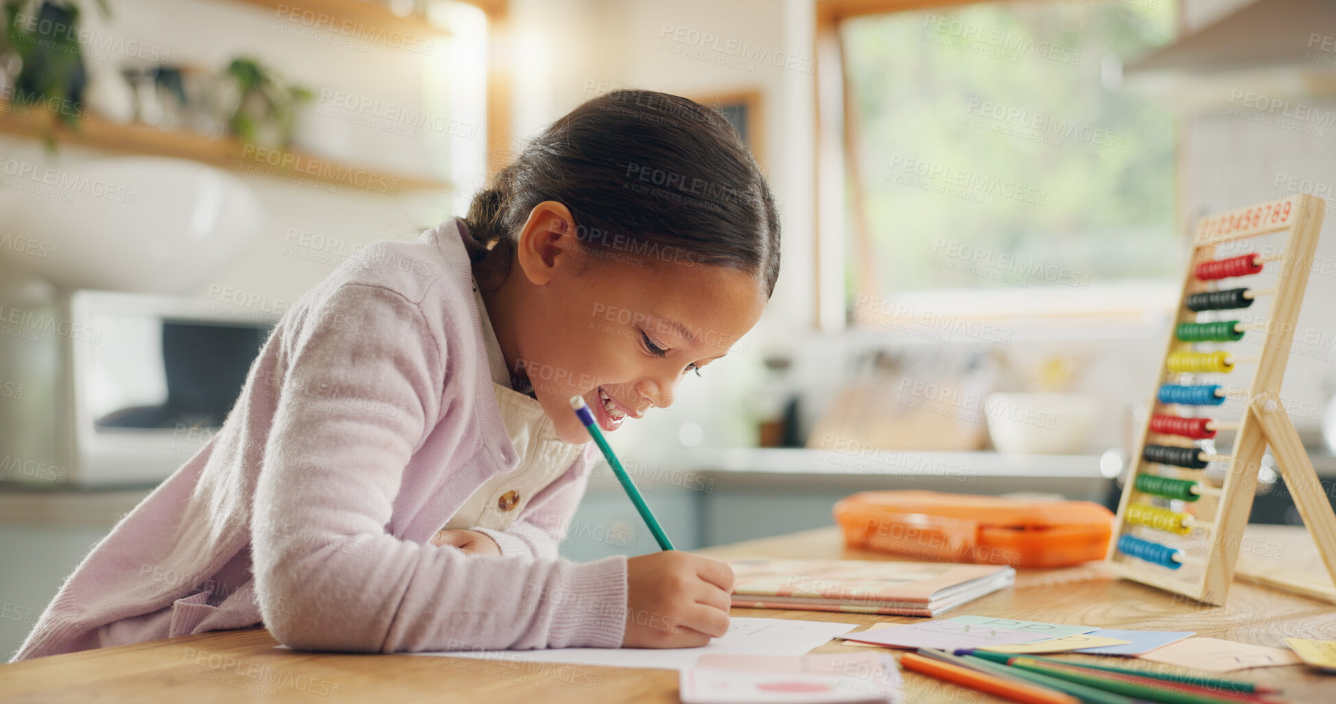 Buy stock photo Learning, writing and happy girl child in a kitchen with maths, homework or counting practice in her home. Education, creative and kid student smile while drawing on table for homeschool art lesson