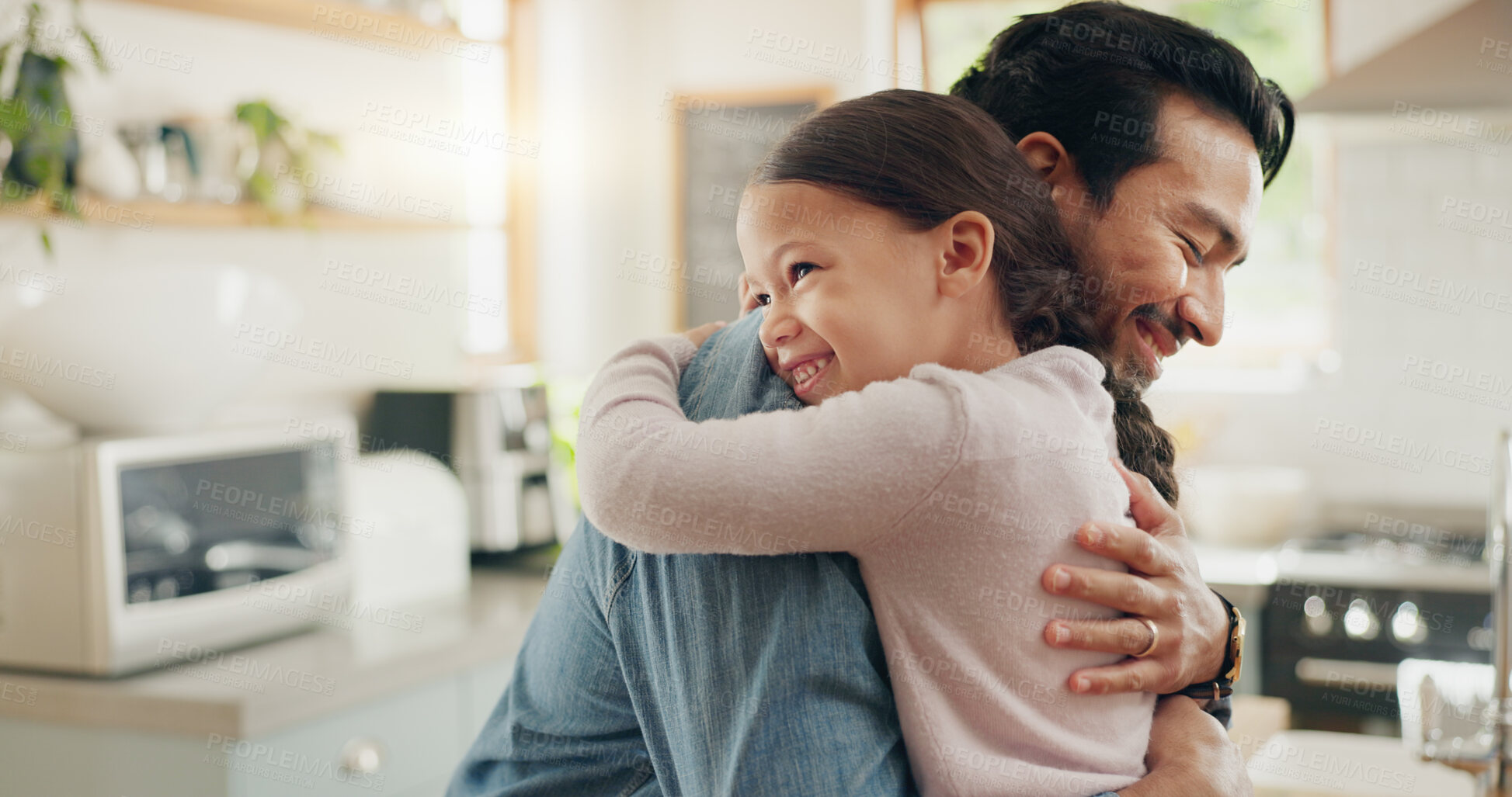 Buy stock photo Family, father and daughter hug in the kitchen for love, trust or bonding together in their home. Kids, smile and safety with a happy young man embracing his adorable girl child in their house