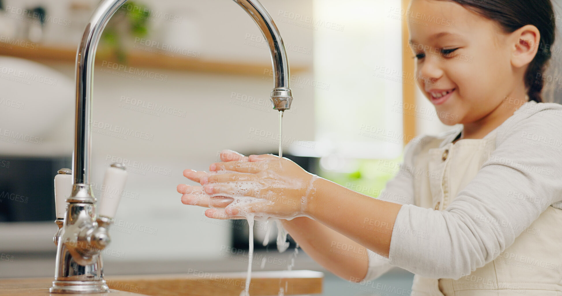 Buy stock photo Washing hands, water and happy girl child in kitchen for hygiene, safety or responsibility at home. Smile, cleaning and female kid at a sink for palm scrub, learning and care, bacteria or prevention