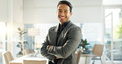Crossed arms, happy and business Asian man in office for leadership, empowerment and success. Corporate, manager and portrait of person with funny joke in workplace for ambition, pride and confidence