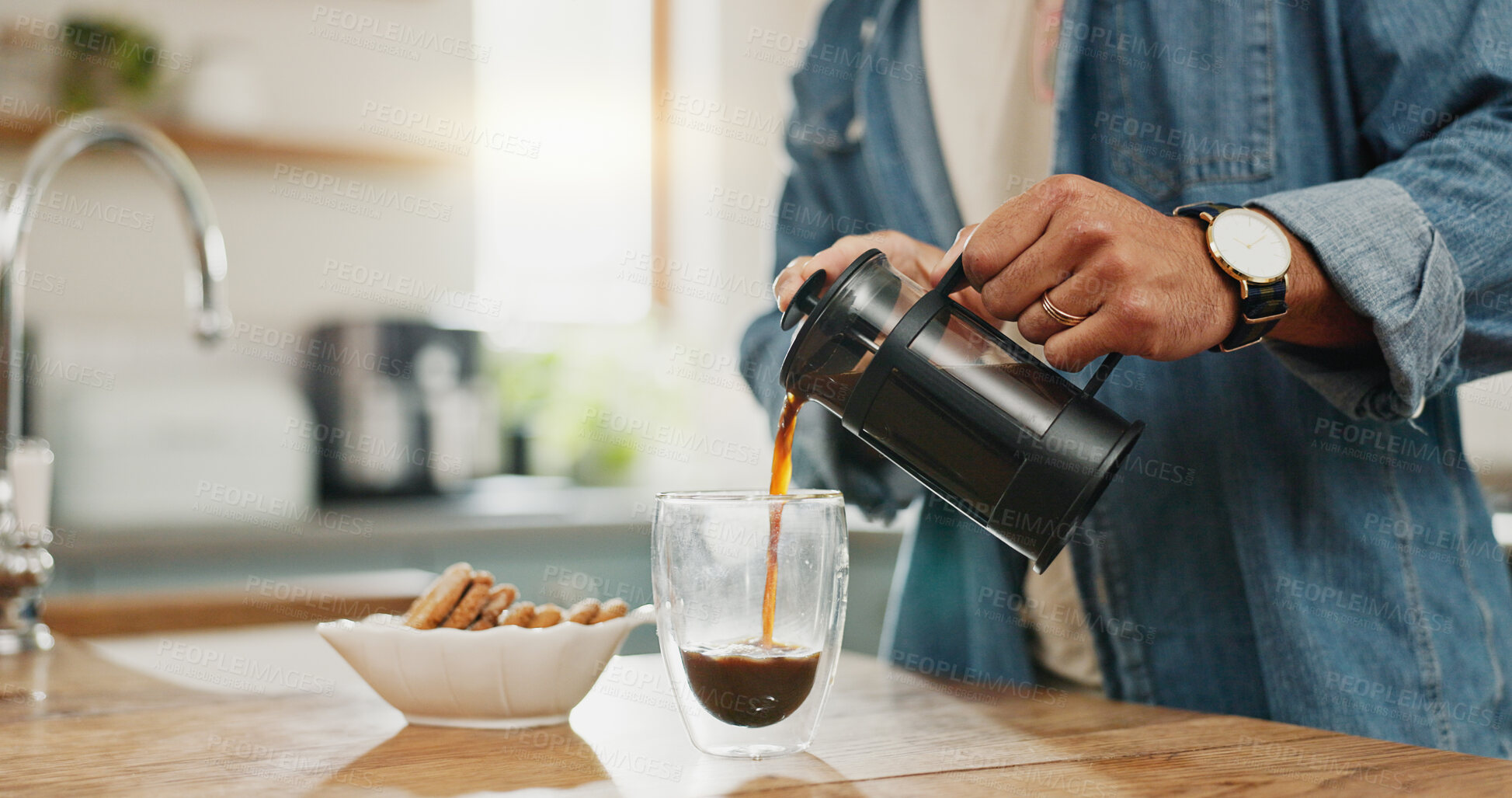 Buy stock photo Hands, pouring coffee and breakfast in home kitchen, energy and start morning with warm matcha at table. Man, filter kettle and french press plunger for fresh organic caffeine at house for hot drink