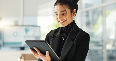 Happy businesswoman in office with tablet, email or social media for business feedback, schedule or agenda. Smile, digital app and woman networking online for market research, web review and report.