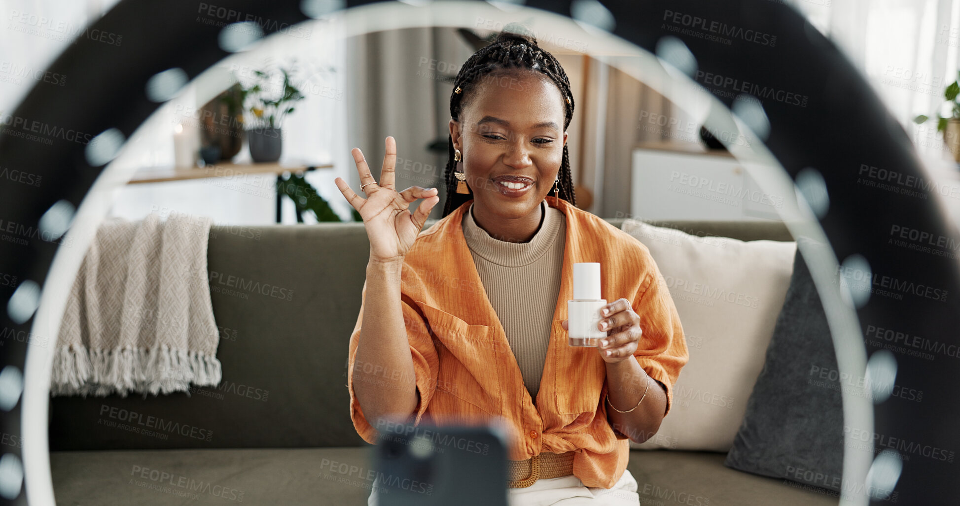 Buy stock photo Video, content creator and black woman doing skincare for tutorial on social media or the internet. Dermatology, happy and African female influencer filming or live streaming face routine at home.