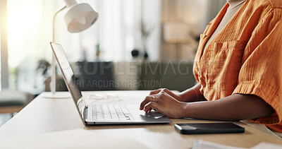Hands of woman at desk, typing and laptop for remote work, social media or blog post research with in home office. Freelance girl with computer writing email, website or online chat in apartment.
