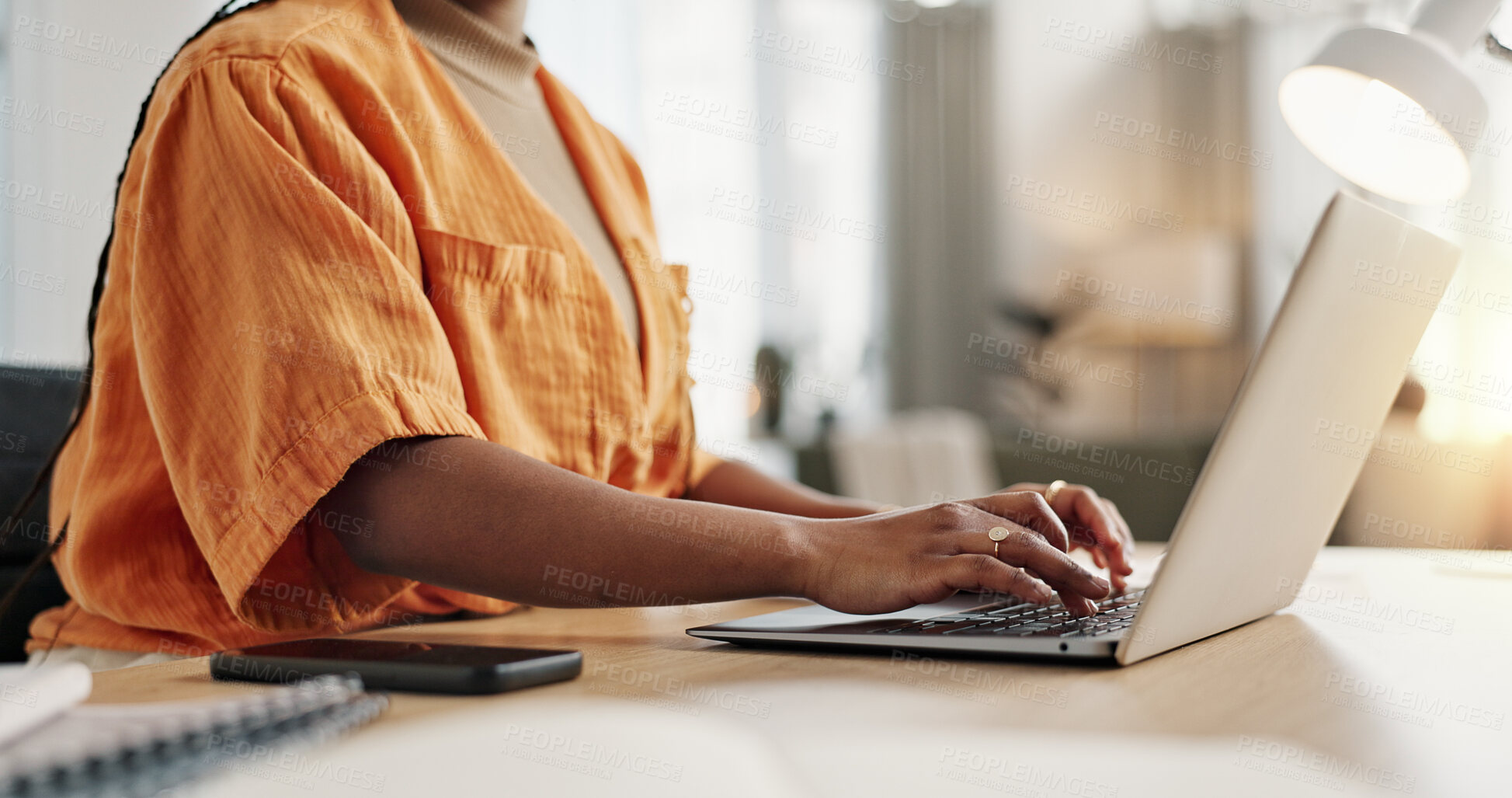 Buy stock photo Black woman with laptop, typing and remote work in social media, blog post or online research in home office. Freelancer at desk with computer with email, website review or writing article in house.