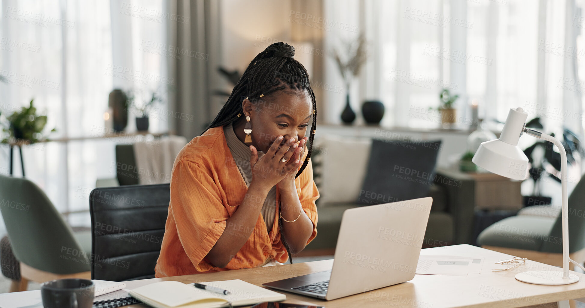 Buy stock photo Black woman, surprise in home office and celebration at laptop for remote work, social media or excited blog. Happy girl at desk with computer for winning email, achievement and success in freelance