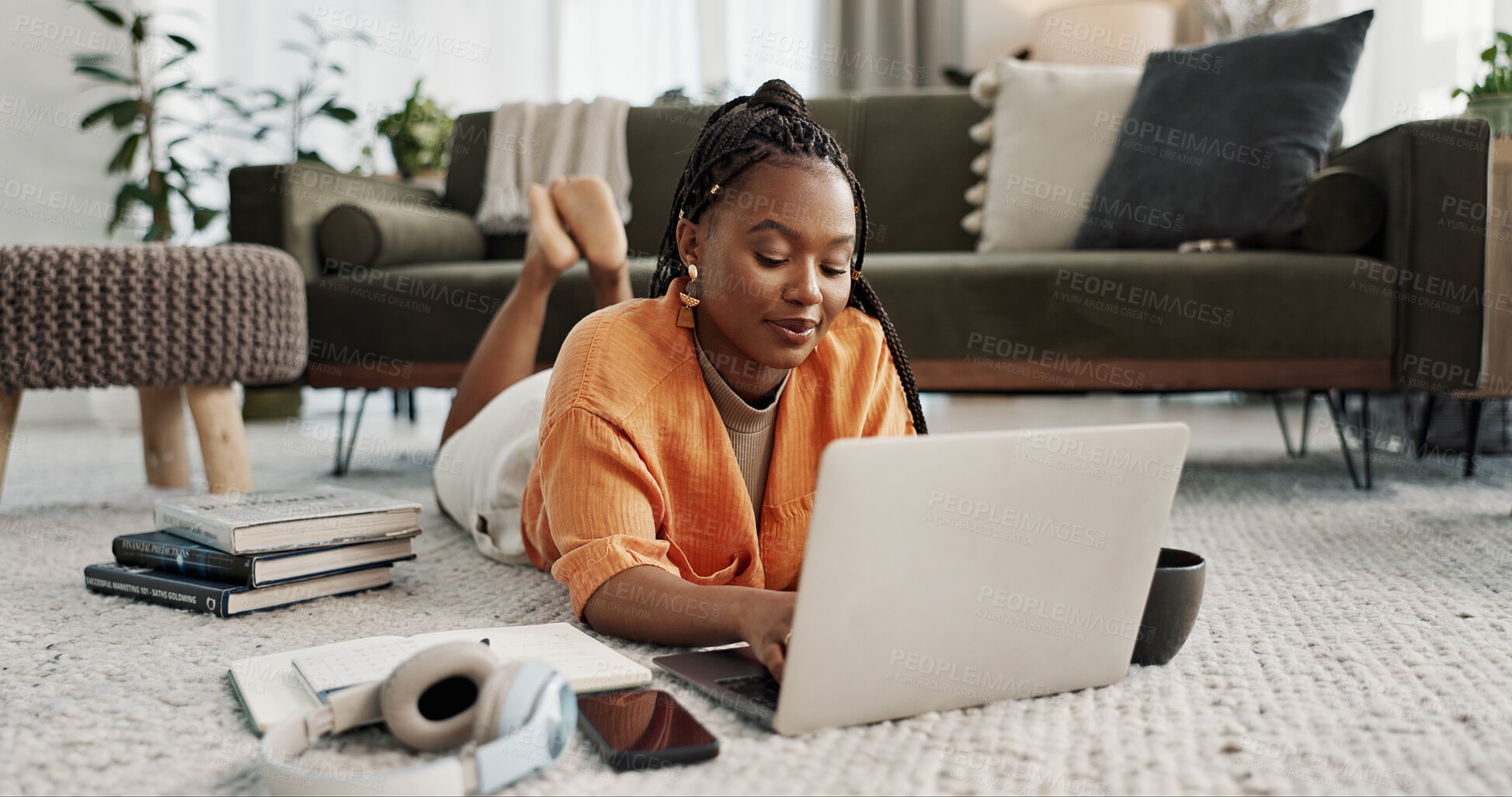 Buy stock photo Laptop, education and a student black woman on the floor of a living room to study for a test or exam. Computer, smile and a happy young person learning with an online course for upskill development