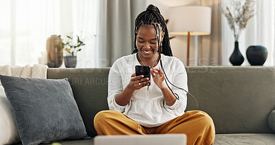 Happy, black woman and credit card with phone on sofa for online shopping, payment code and fintech at home. Mobile banking, finance and password to upgrade subscription, ecommerce and money savings