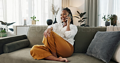 Black woman on sofa, relax and phone call for networking, conversation and connection with smile in home. Happy girl on couch with smartphone, funny discussion and online chat in living room of house