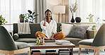 Black woman on sofa, relax and phone call for good news, conversation and connection with smile in home. Happy girl on couch with smartphone, funny discussion and online chat in living room of house