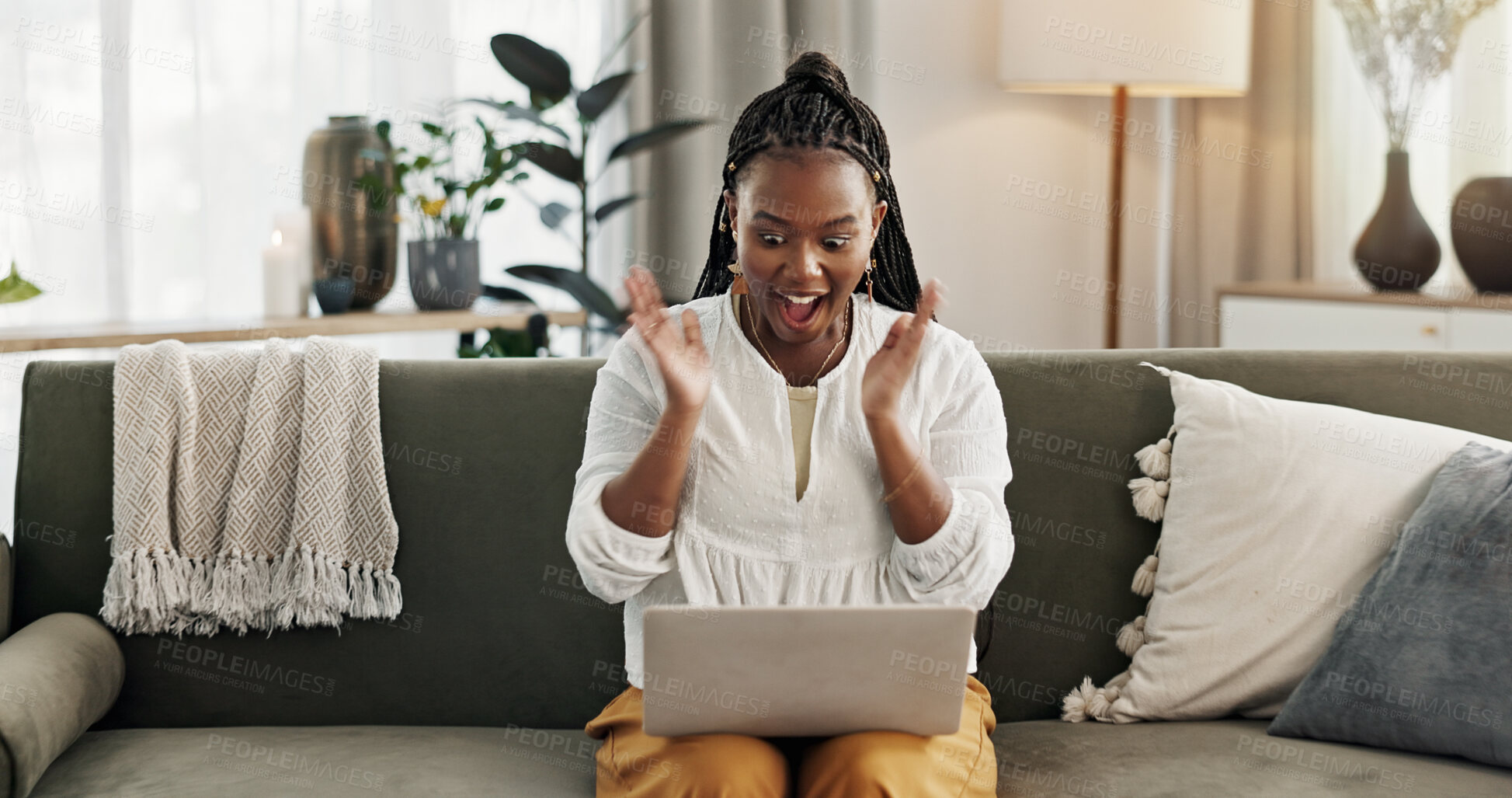 Buy stock photo Black woman on sofa, surprise and celebration with laptop for remote work, social media or excited announcement. Happy girl on couch with computer for winning email, achievement and success in home.