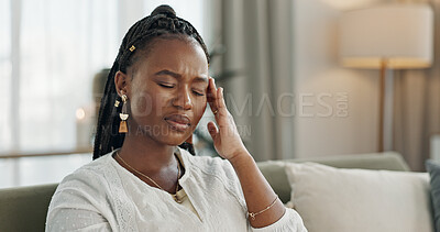 Headache, stress and young black woman in the living room of her modern apartment on weekend. Burnout, mental health and sick African female person with migraine for illness in lounge at home.