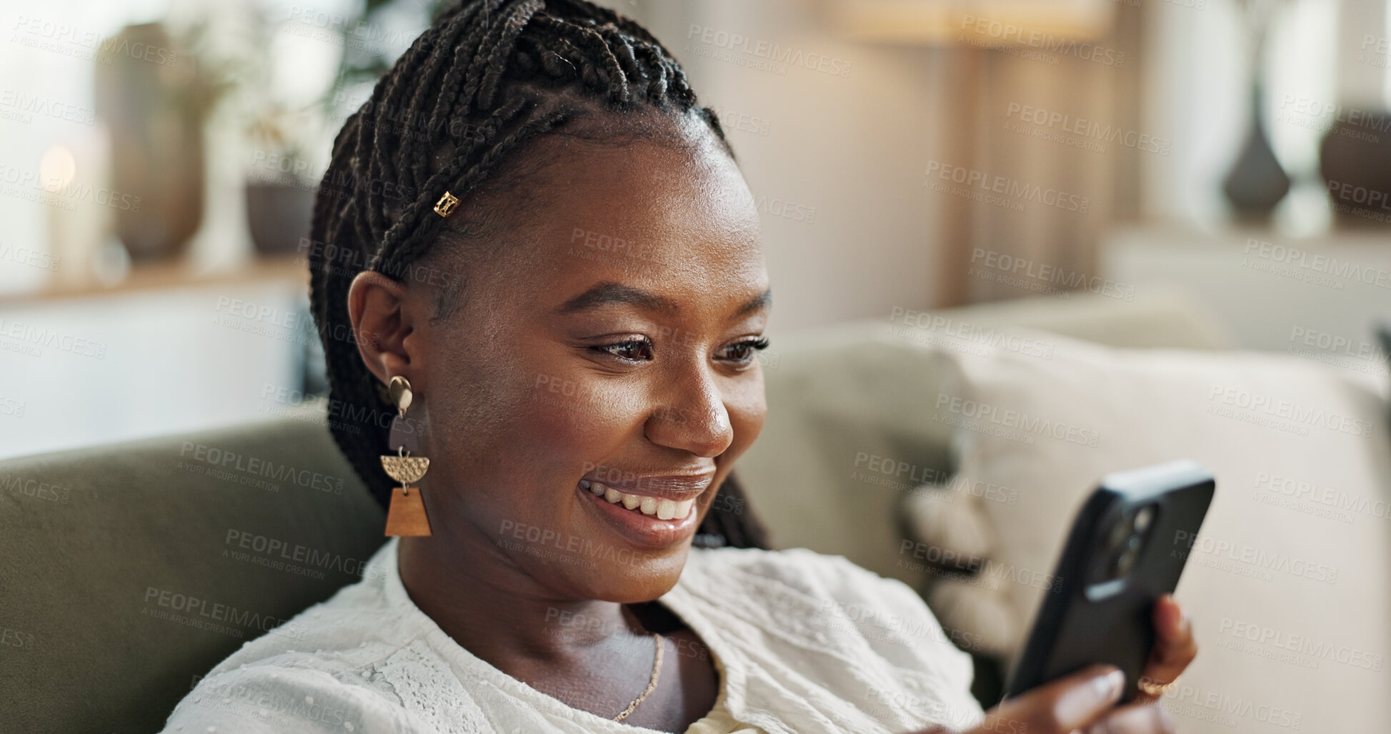 Buy stock photo Home, funny and black woman on a couch, smartphone and connection with social media, comedy post and laugh. African person, apartment or girl on sofa, cellphone or mobile user with humor, joy or joke