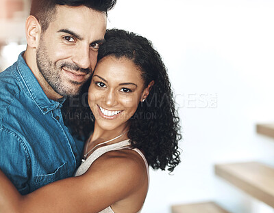 Buy stock photo Hugging, love and affection couple loving, happy and smiling. Interracial boyfriend and girlfriend bonding together, dating and feeling positive. Portrait of cheerful married man and woman embracing