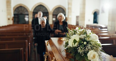 Funeral, church and people with coffin for goodbye, mourning and grief in memorial service. Depression, family and sad senior women with casket in chapel for greeting, loss and burial for death