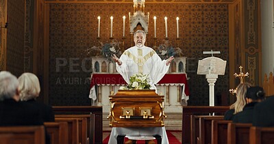 Funeral, church and pastor with prayer by coffin for memorial service, sermon and ceremony for death. Religion, guidance and male priest praying with congregation for comfort with casket in chapel
