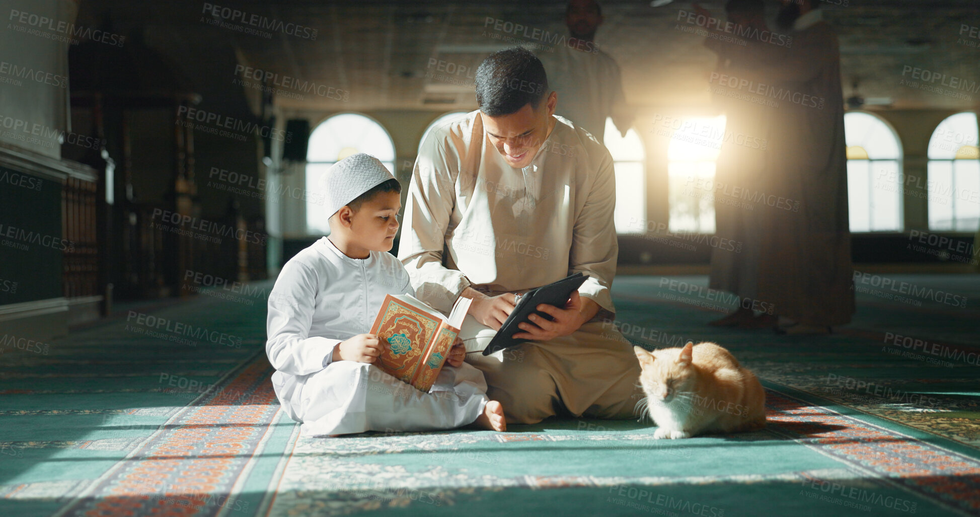 Buy stock photo Quran, child and man teaching in a mosque for praying, peace and spiritual care in holy religion for Allah. Reading book, learning or Muslim person with tablet, kid or education to help worship God