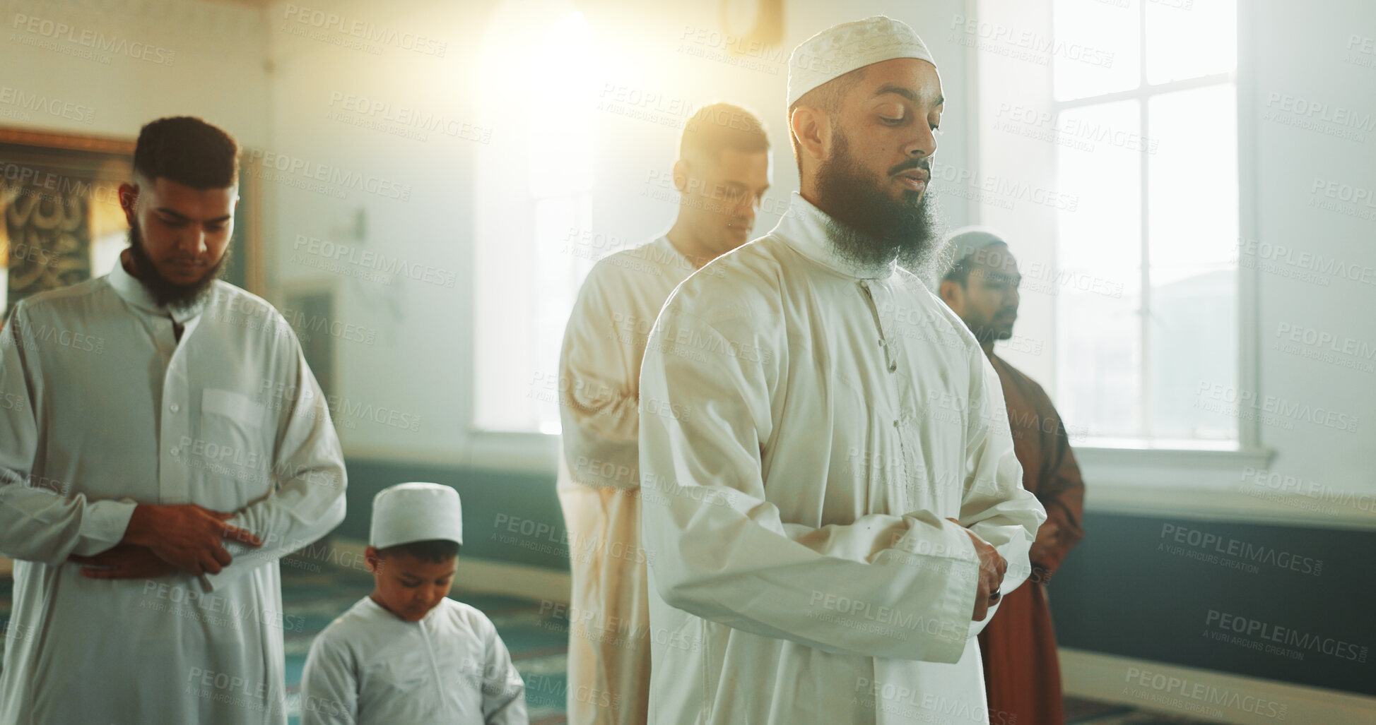 Buy stock photo Islam, people and praying together in mosque for religion, Friday or Ramadan in holy temple. Muslim group and leader with belief or culture, Eid Mubarak and hands raised for praise to Allah