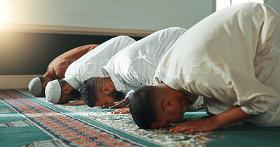 Muslim, praying and men in a Mosque for spiritual religion together as a group to worship Allah in Ramadan. Islamic, Arabic and holy people with peace or respect for gratitude, trust and hope
