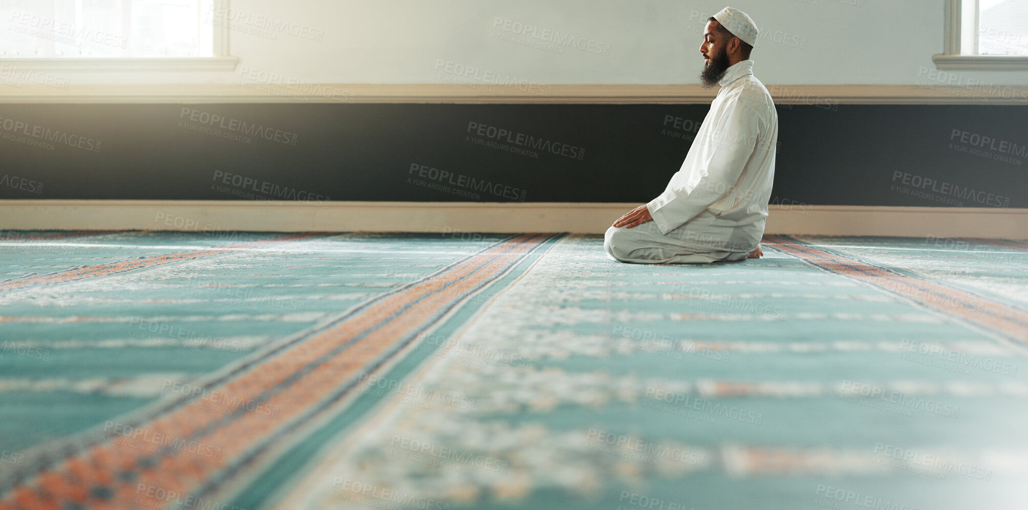 Buy stock photo Praying, islamic and man with faith in a mosque for gratitude, peace and spiritual care in holy religion for Allah. Respect, Ramadan and Muslim person with kindness, hope and humble after worship