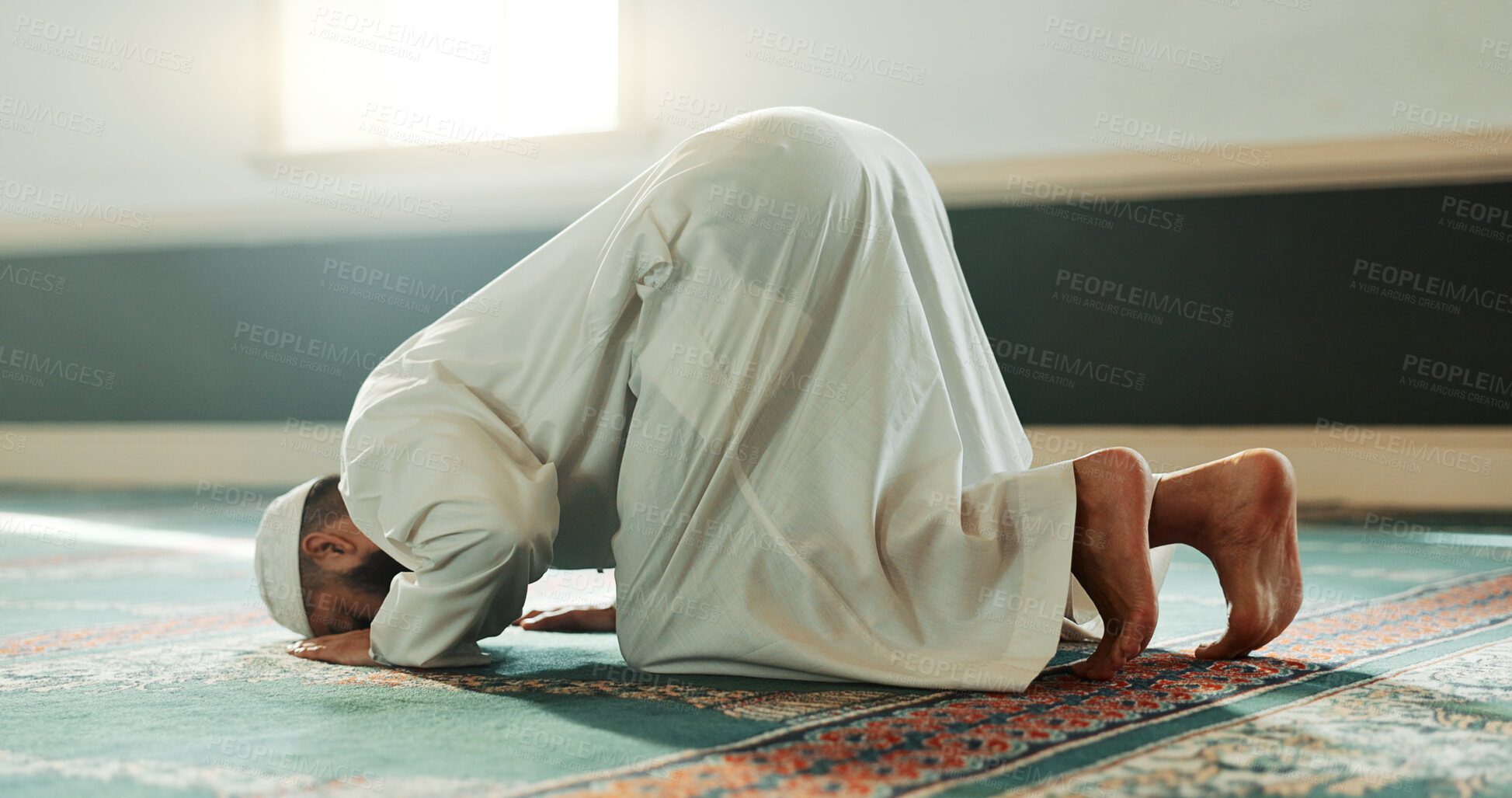 Buy stock photo Praying, Muslim and man with faith in a mosque for praying, peace and spiritual care in holy religion for Allah. Respect, Ramadan and Islamic person with kindness, hope and humble after worship